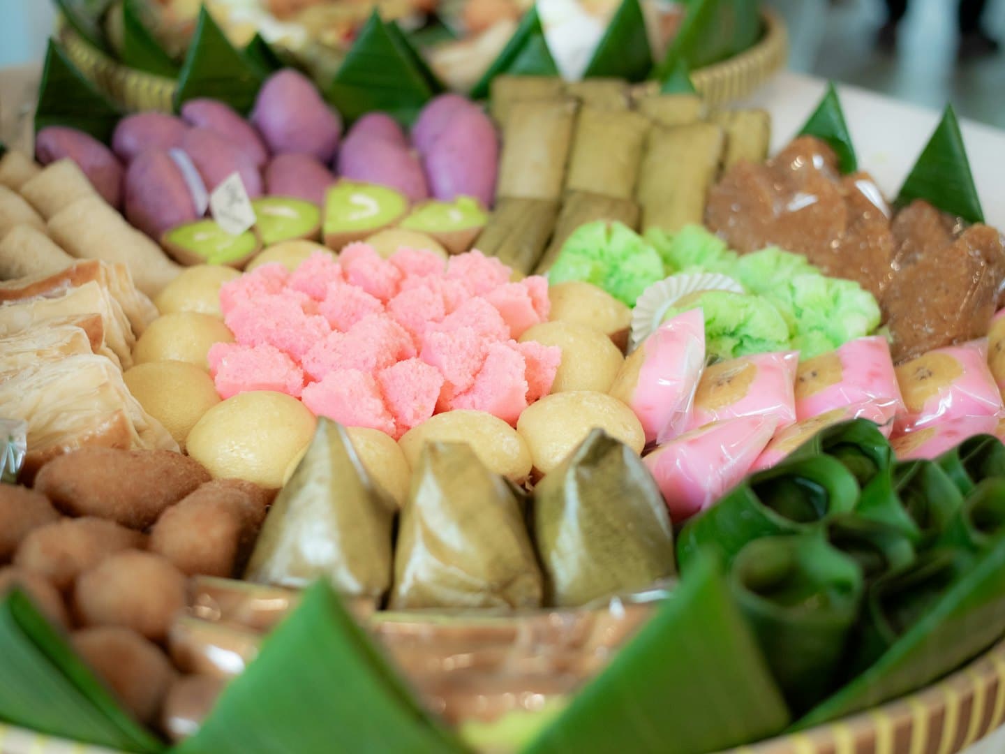 Assortment of traditional snacks in a woven basket.